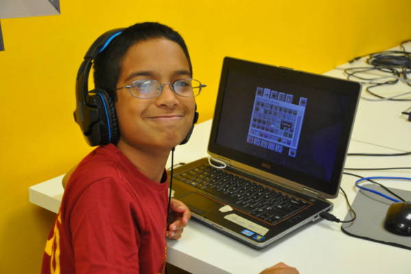 Boy playing Minecraft at Empow Studios