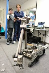Instructor and Student operating robot at Empow Studios