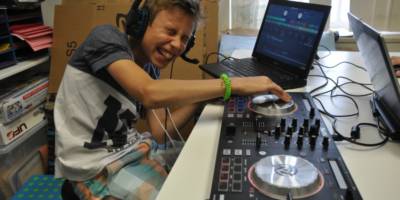 Student playing with DJ curriculum