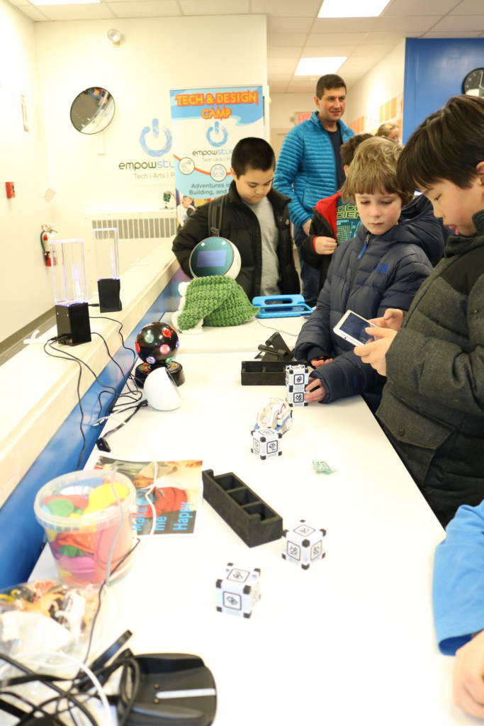 Children are hands-on at iRobot Robotics Week at Empow Studios